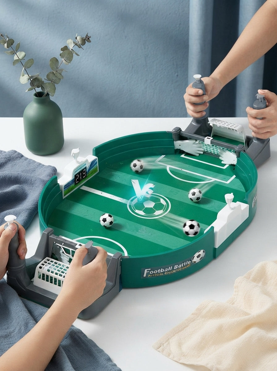 KIVO tabletop soccer game displayed on a clean white table with forest green and slate blue decor accents.
